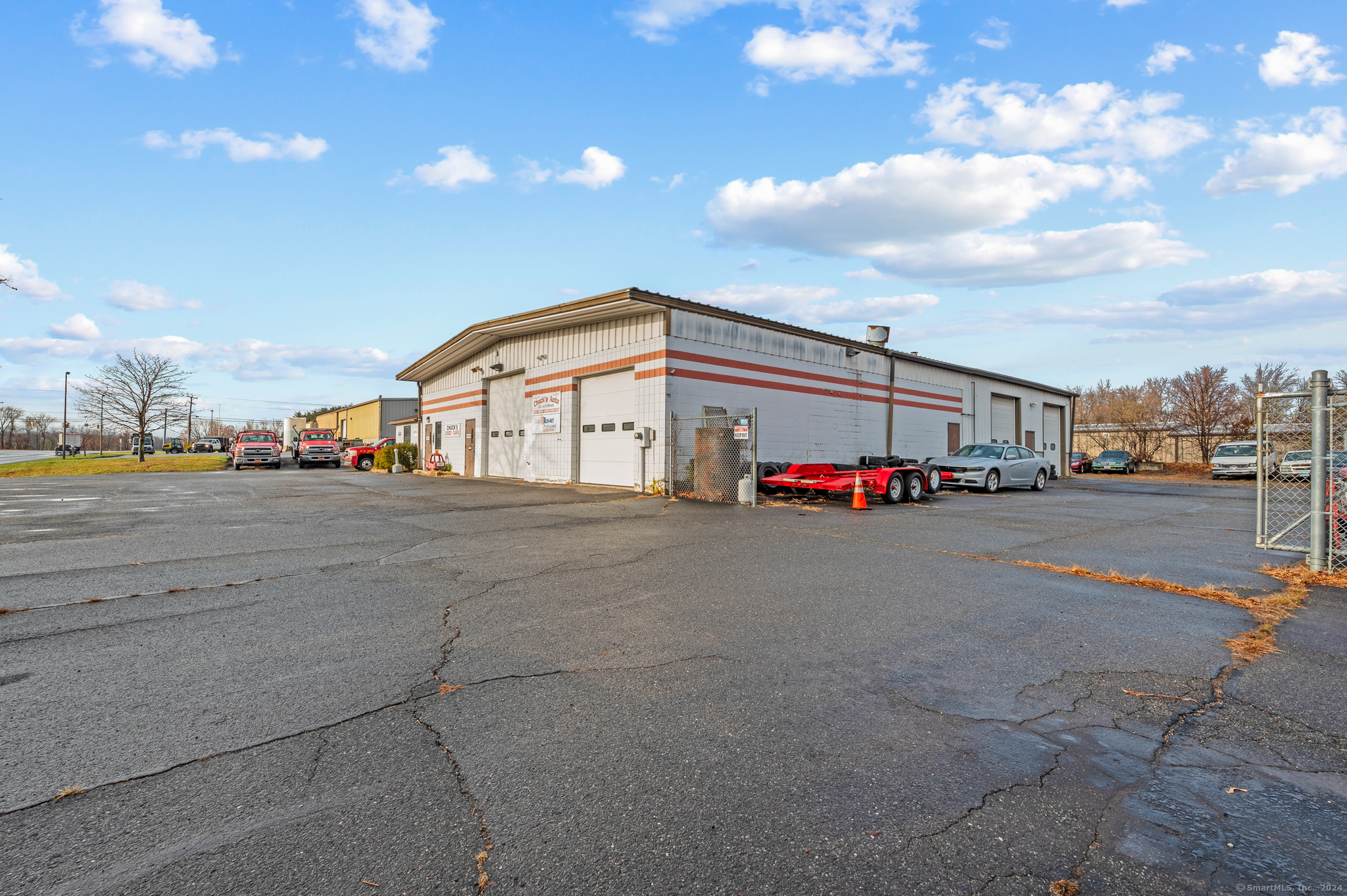 15 King Spring Road Windsor Locks, CT 06096 - Photo 5 of 27 a group of cars parked in front of building