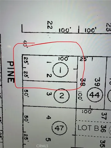 view of a utility room with washer and a a white stove