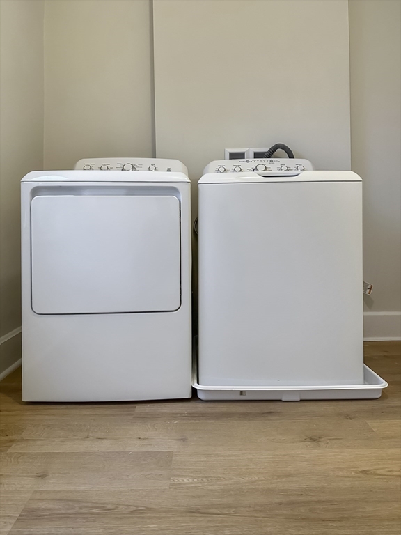 55 Hollander Street, Unit 2 Boston, MA 02121 - Photo 7 of 8 a utility room with dryer and washer