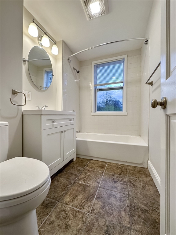 55 Hollander Street, Unit 2 Boston, MA 02121 - Photo 8 of 8 a bathroom with a sink a toilet and bathtub