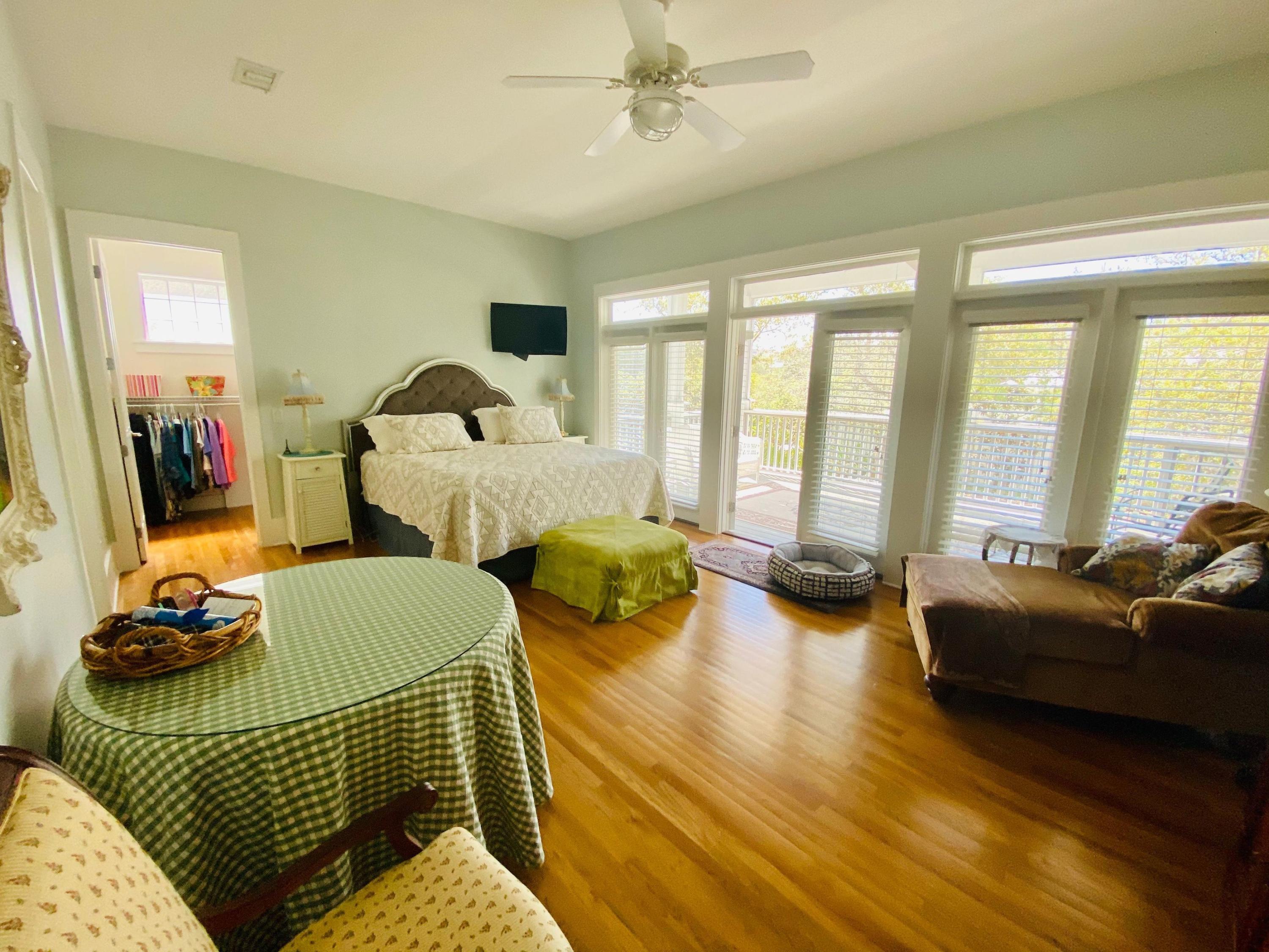 170 Old Beach Road Santa Rosa Beach, FL 32459 - Photo 20 of 35 a bedroom with furniture and a large window
