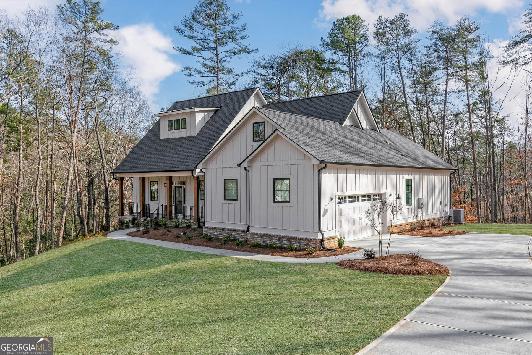 649 Oxford Road Ball Ground, GA 30107 - Photo 1 of 1 a front view of a house with a yard