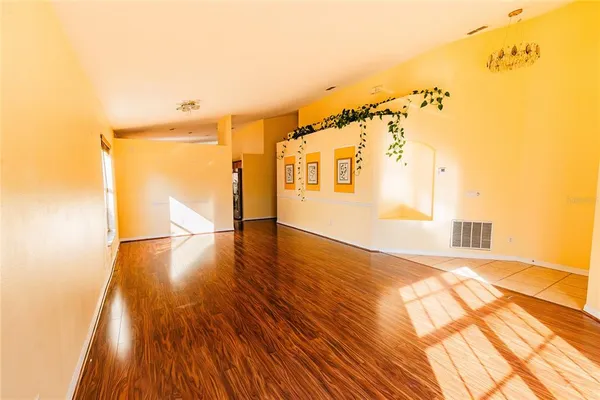 a view of livingroom with furniture and wooden floor