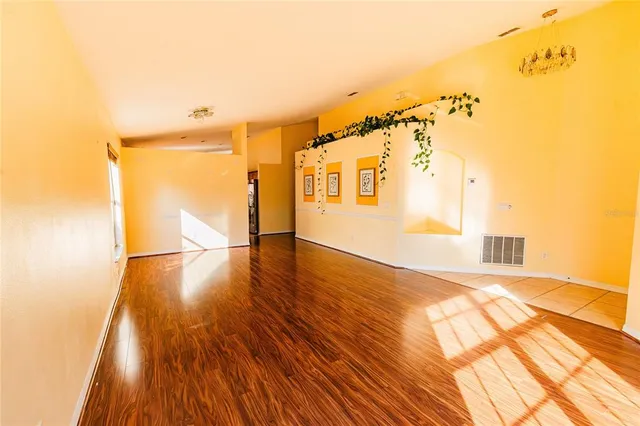 a view of livingroom with furniture and wooden floor