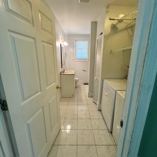 2344 Ripplewater Drive Southeast Atlanta, GA 30316 - Photo 11 of 18 a bathroom with a sink a toilet and shower