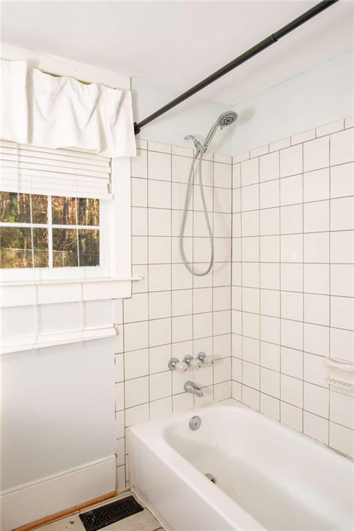 2344 Ripplewater Drive Southeast Atlanta, GA 30316 - Photo 16 of 18 a bathroom with a bathtub and shower