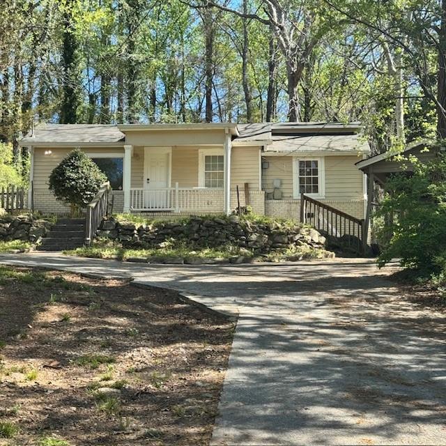 2344 Ripplewater Drive Southeast Atlanta, GA 30316 - Photo 18 of 18 a front view of a house with a yard