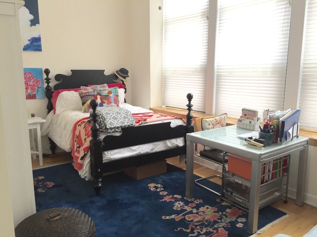 1016 West Madison Street, Unit 2S Chicago, IL 60607 - Photo 13 of 20 a bedroom with a bed and a table in it