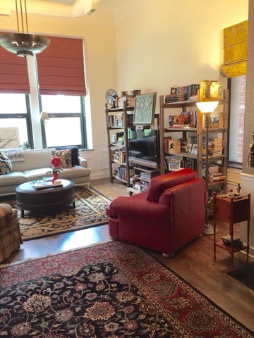 1016 West Madison Street, Unit 2S Chicago, IL 60607 - Photo 4 of 20 a living room with furniture and a floor to ceiling window