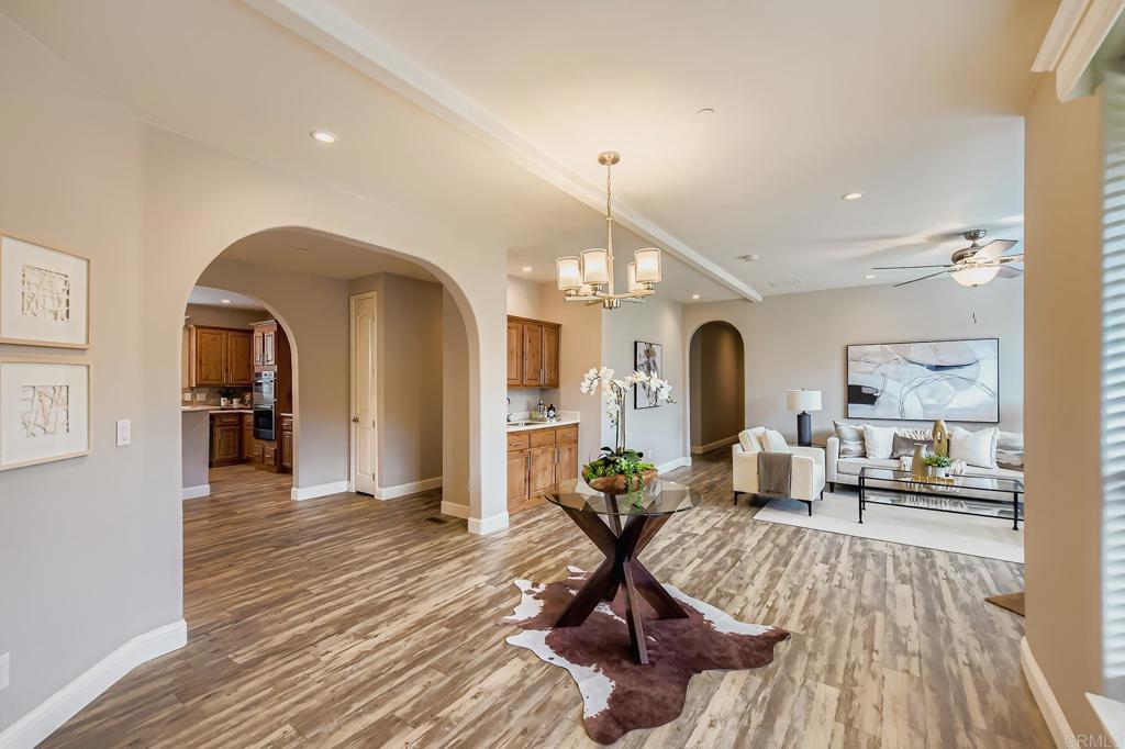28720 North Twin Oaks Valley Road Vista, CA 92084 - Photo 12 of 66 a view of a living room and dining room