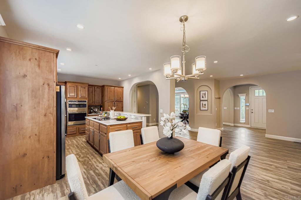 28720 North Twin Oaks Valley Road Vista, CA 92084 - Photo 16 of 66 a view of a dining room with furniture