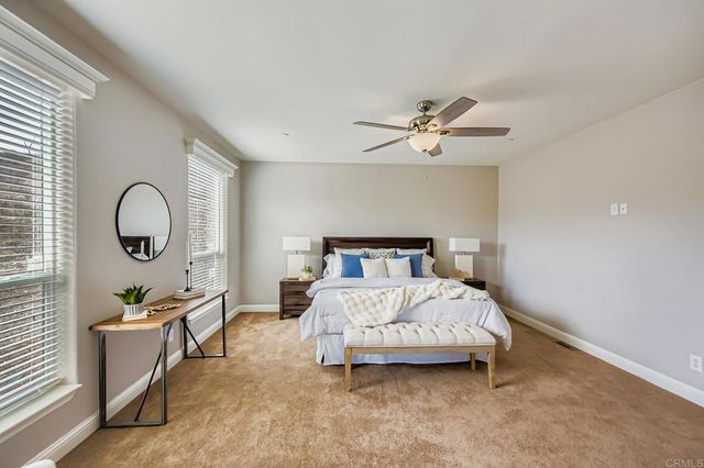 a bathroom with a tub and shower