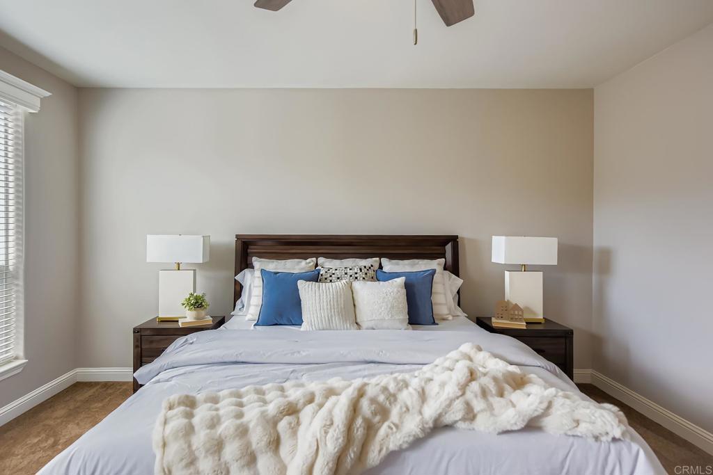 28720 North Twin Oaks Valley Road Vista, CA 92084 - Photo 29 of 66 a bedroom with a bed and a night stand