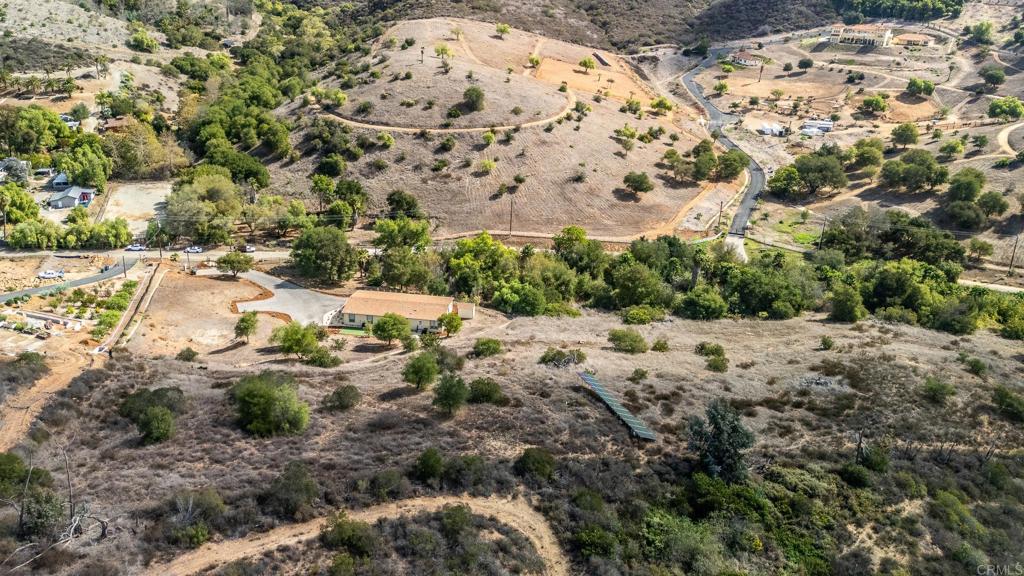 28720 North Twin Oaks Valley Road Vista, CA 92084 - Photo 50 of 66 a view of a yard with a tree