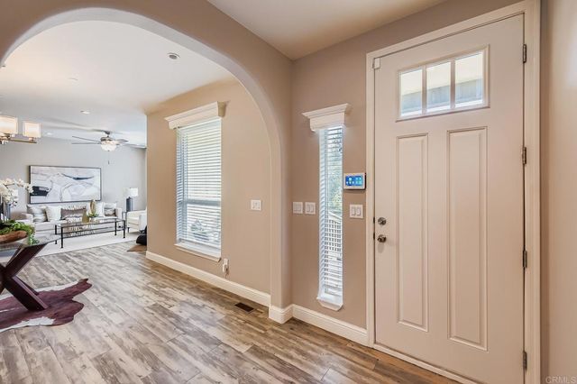 a view of a living room and dining room