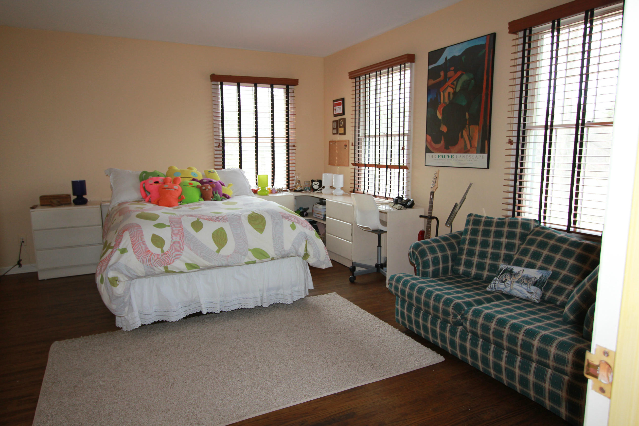 595 Smith Ridge Road New Canaan, CT 06840 - Photo 16 of 25 a bedroom with bed and windows