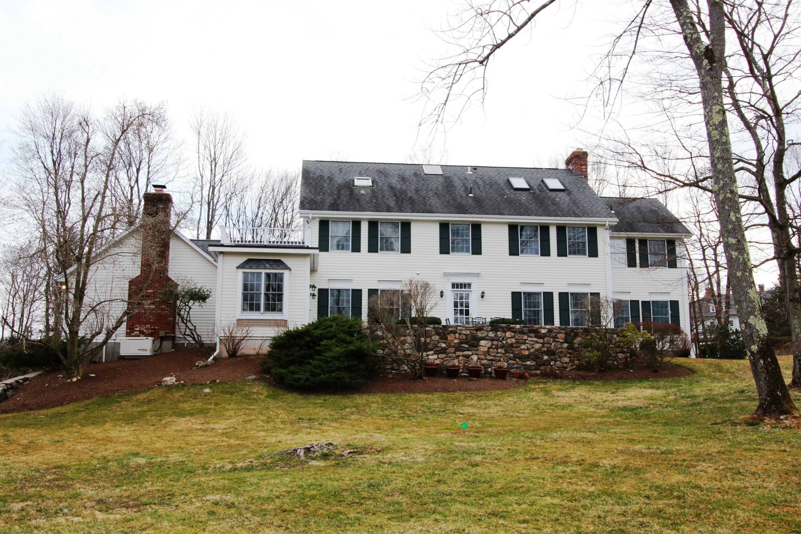 595 Smith Ridge Road New Canaan, CT 06840 - Photo 25 of 25 a front view of a house with swimming pool