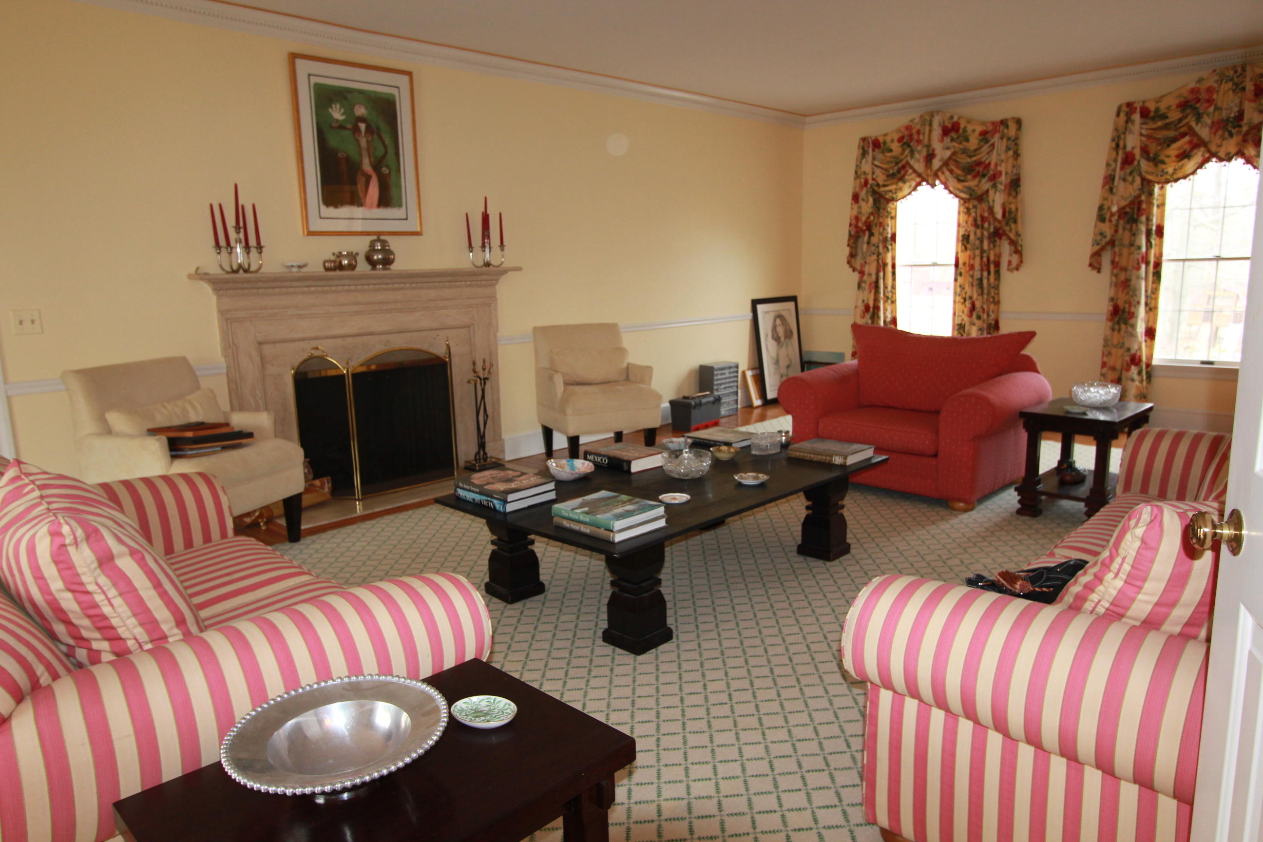 595 Smith Ridge Road New Canaan, CT 06840 - Photo 3 of 25 a living room with furniture fireplace and window