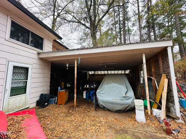 a view of backyard with trees