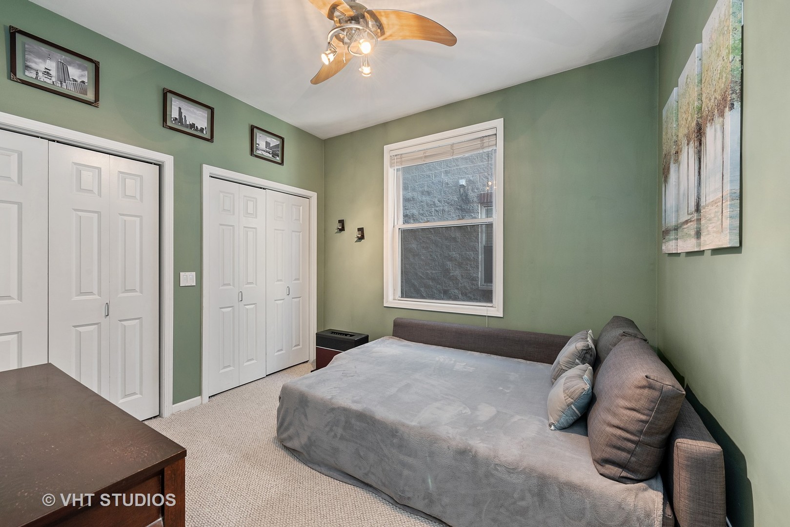 2127 West Rice Street, Unit 2E Chicago, IL 60622 - Photo 8 of 14 a bedroom with a bed and a window
