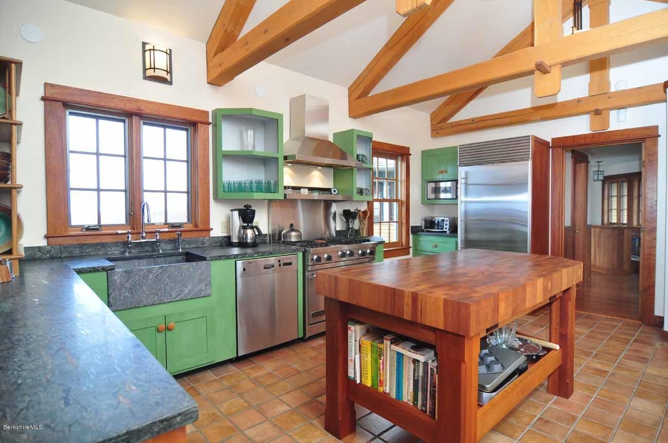 381 Leonhardt Road Becket, MA 01223 - Photo 13 of 47 a kitchen with sink and cabinets