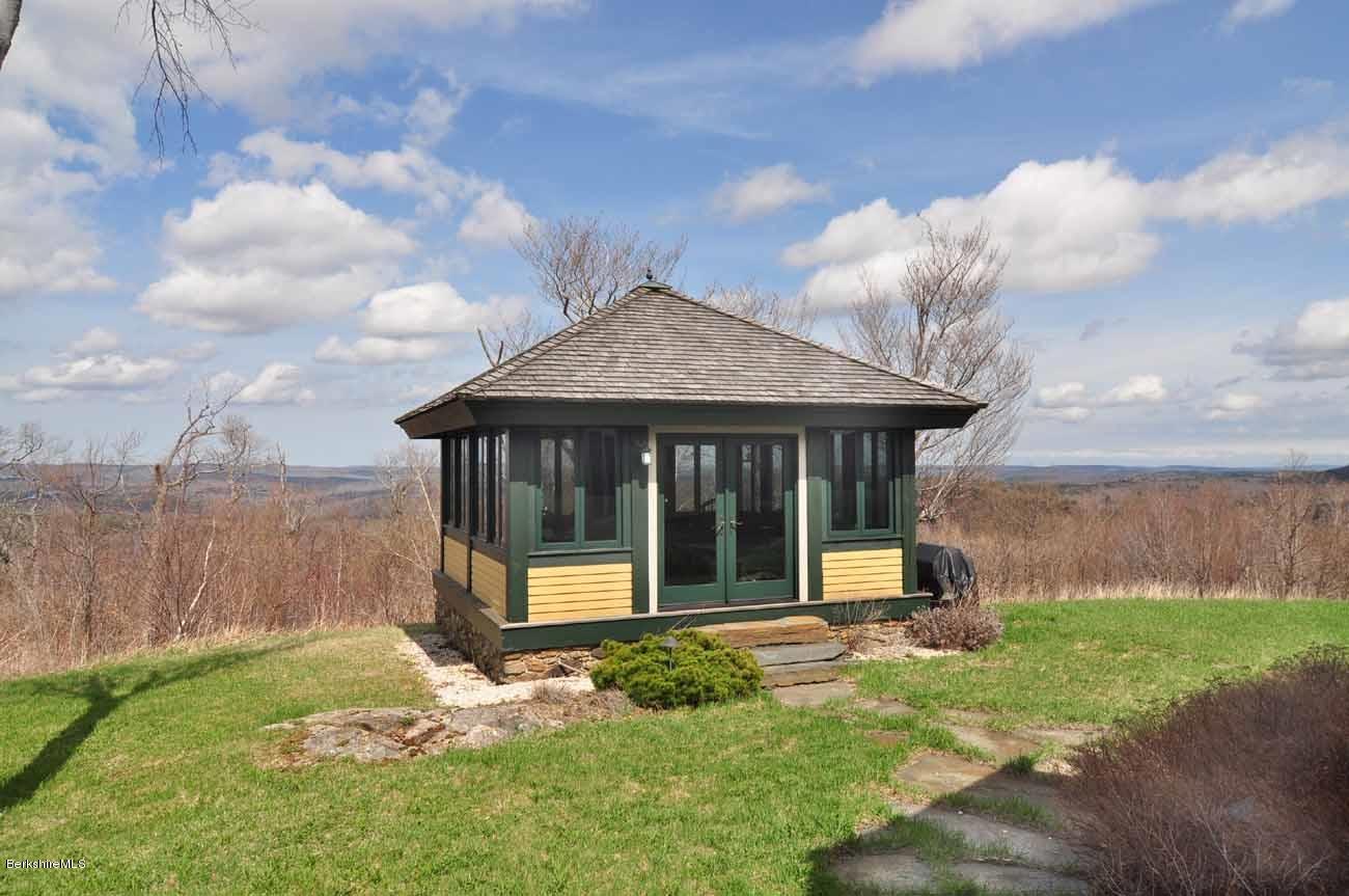381 Leonhardt Road Becket, MA 01223 - Photo 26 of 47 a view of a house with yard and a garden