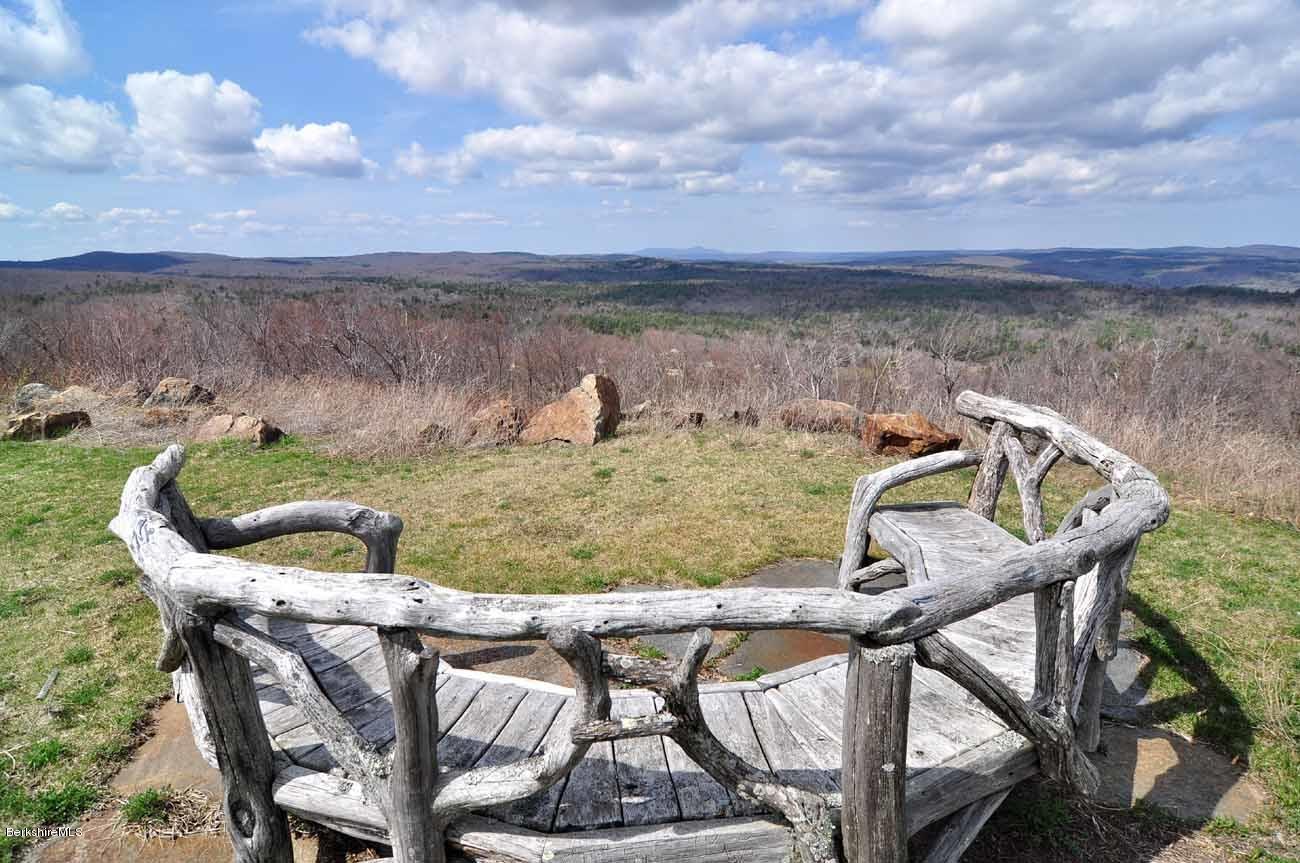 381 Leonhardt Road Becket, MA 01223 - Photo 47 of 47 a view of a chairs and table on the terrace