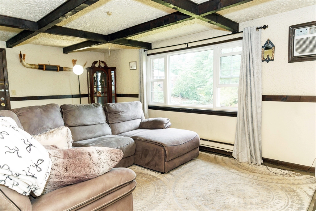 50 Spencer Road, Unit 36L Boxborough, MA 01719 - Photo 5 of 15 a living room with furniture and a large window