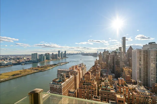 a view of a city and ocean view
