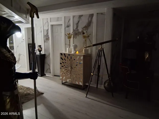 a room with gym equipment and shower