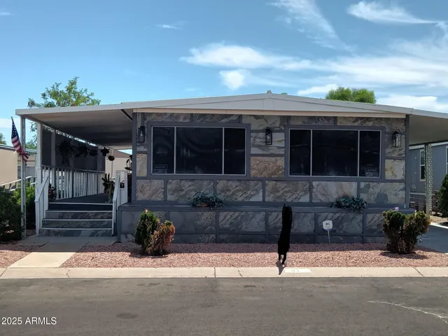 a view of house with patio