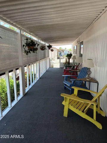 a view of a porch with furniture