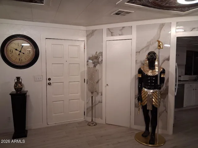 a view of a hallway with elevator