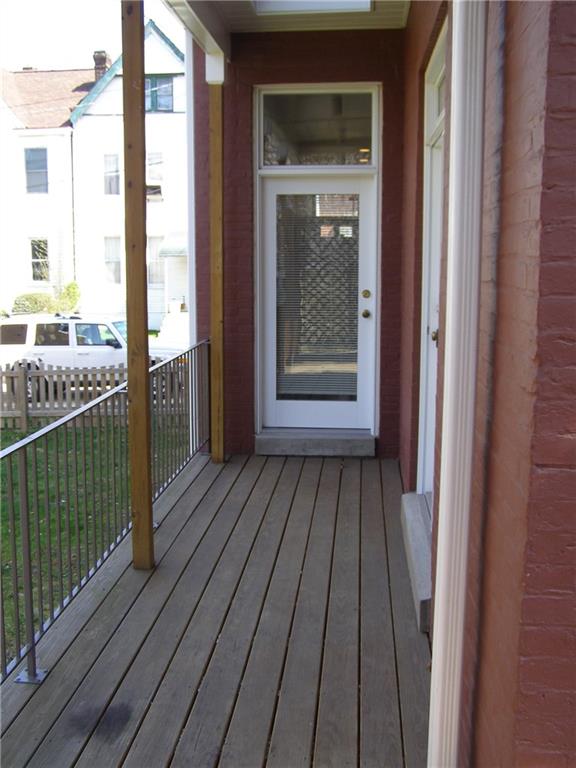 326 Hailman Street Pittsburgh, PA 15206 - Photo 7 of 22 a view of a balcony with wooden floor
