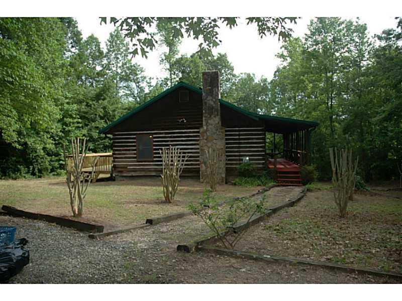 1067 Old Mill Road Ball Ground, GA 30107 - Photo 1 of 1 Yard/Garden. Log Home With New Deck.