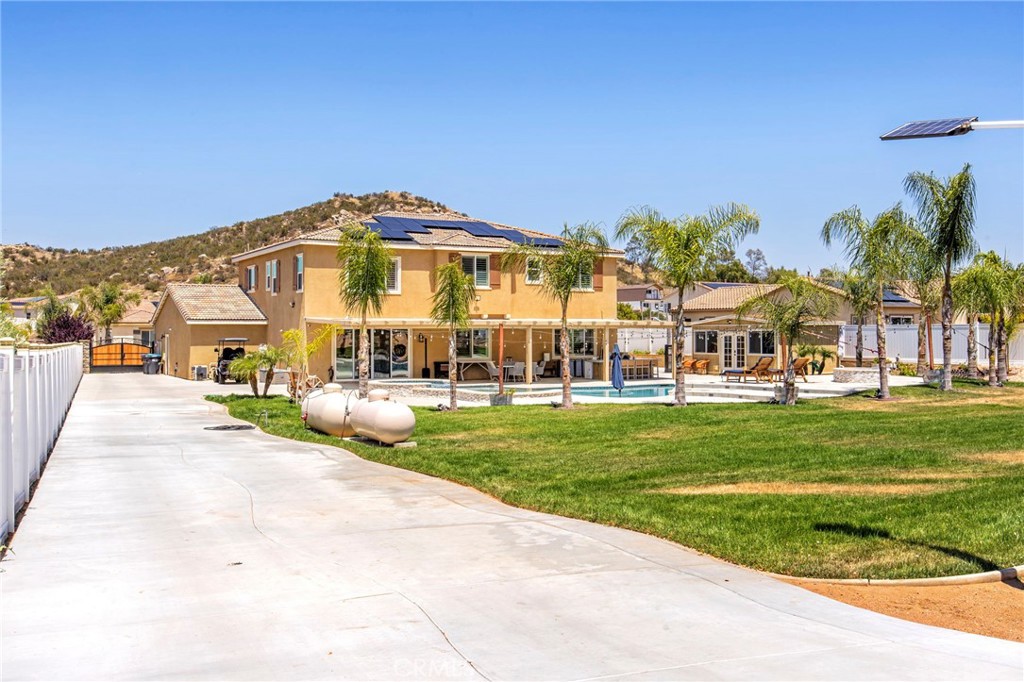 32797 Hayden Road Menifee, CA 92584 - Photo 44 of 51 a view of a house with a yard