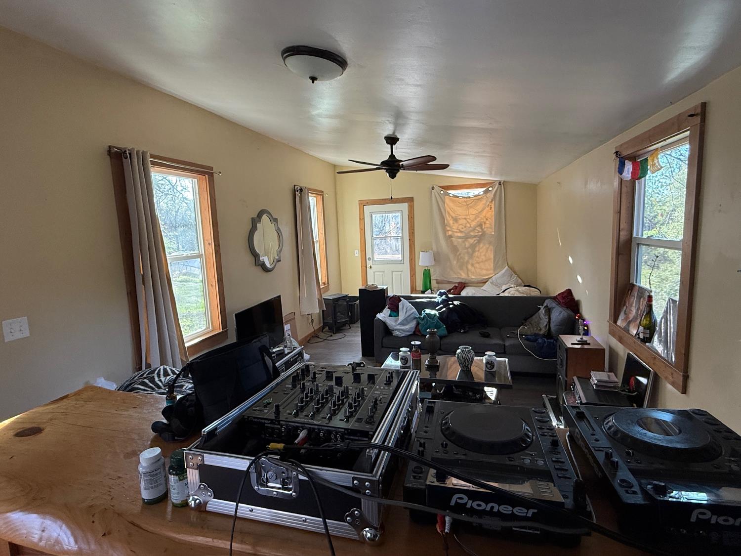 21614 Rockaway Road Nevada City, CA 95959 - Photo 32 of 56 a living room with furniture a window and gym equipment