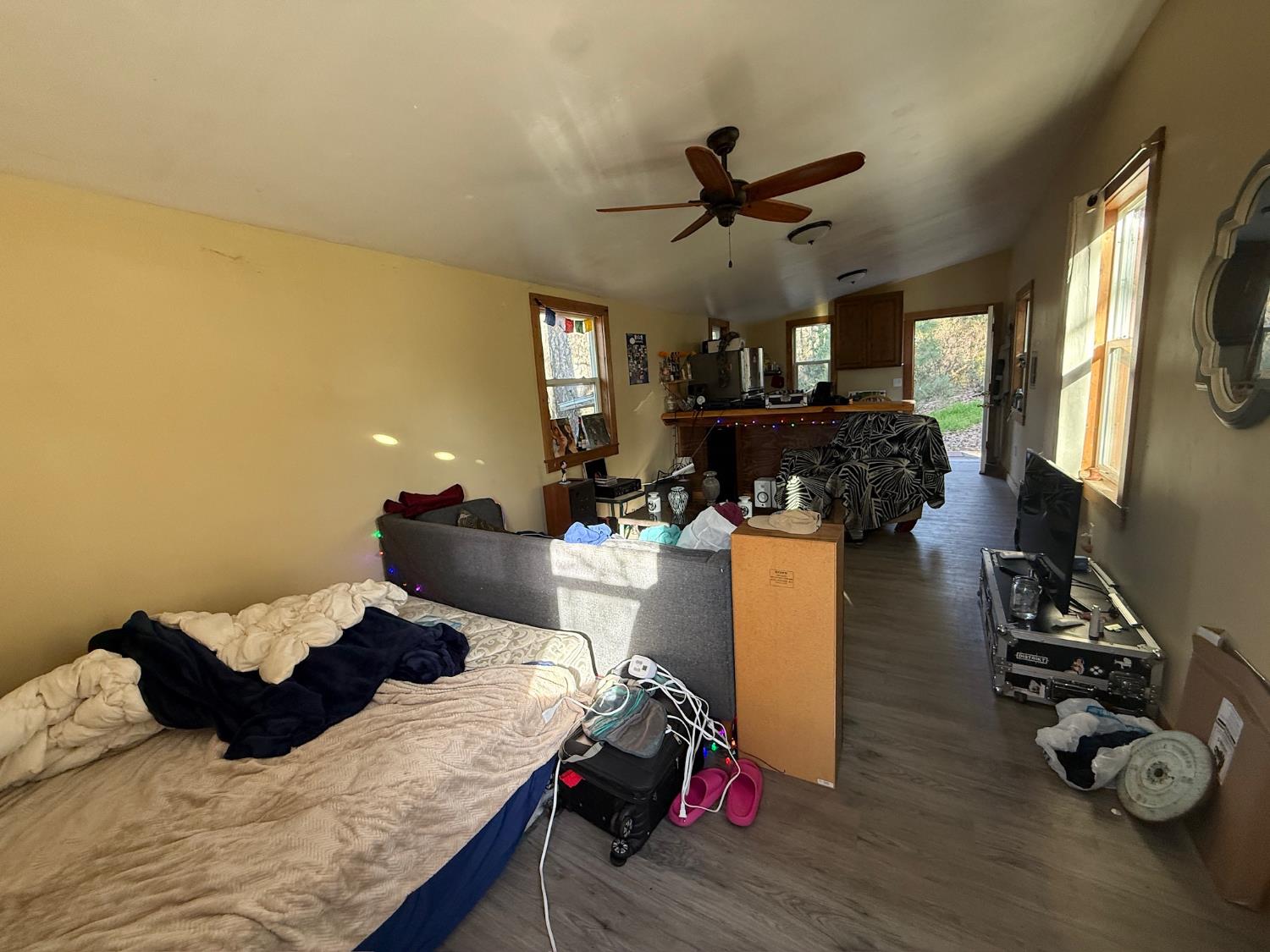 21614 Rockaway Road Nevada City, CA 95959 - Photo 35 of 56 a living room with furniture and a flat screen tv
