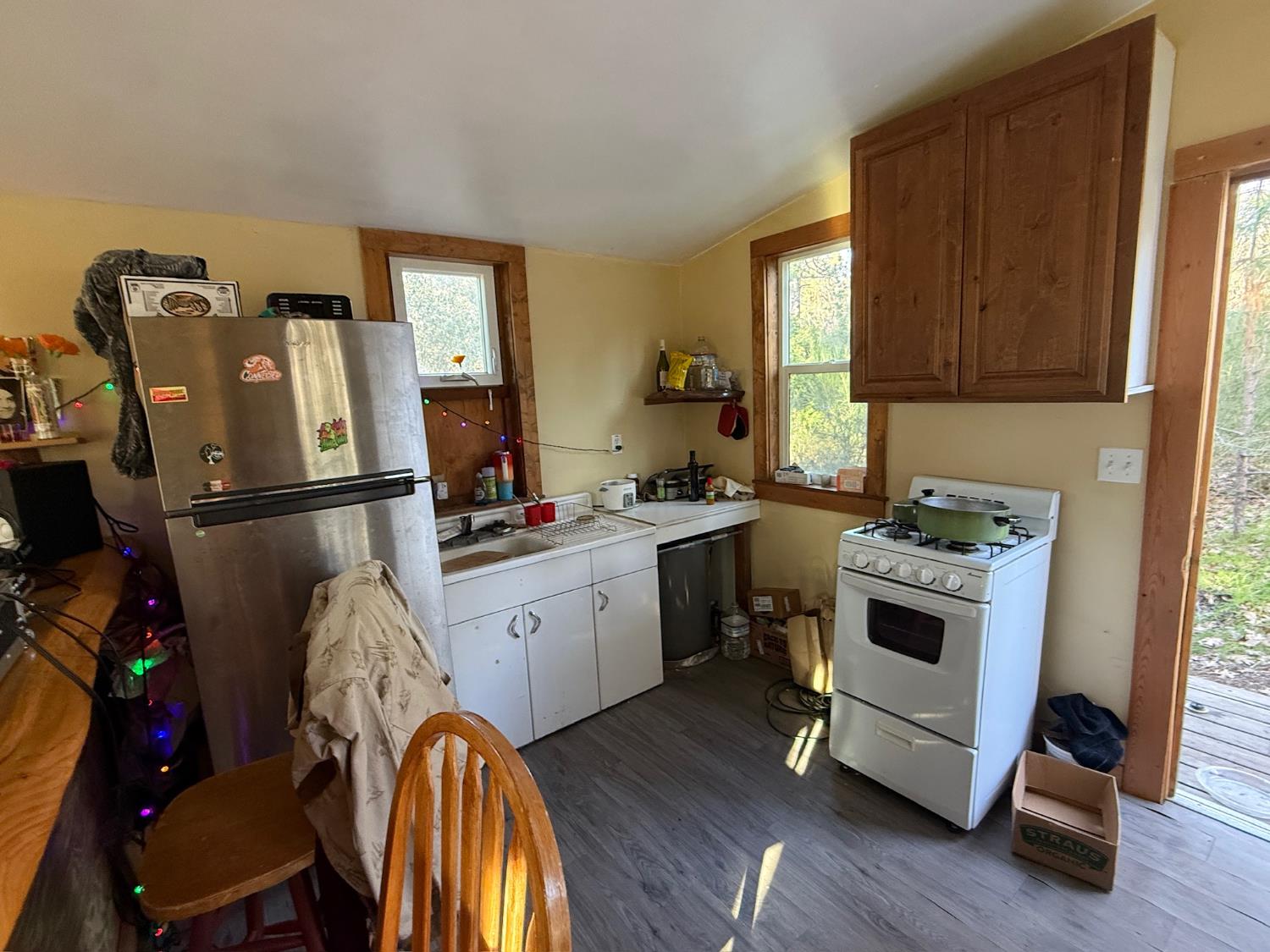 21614 Rockaway Road Nevada City, CA 95959 - Photo 37 of 56 a kitchen with a sink appliances and cabinets