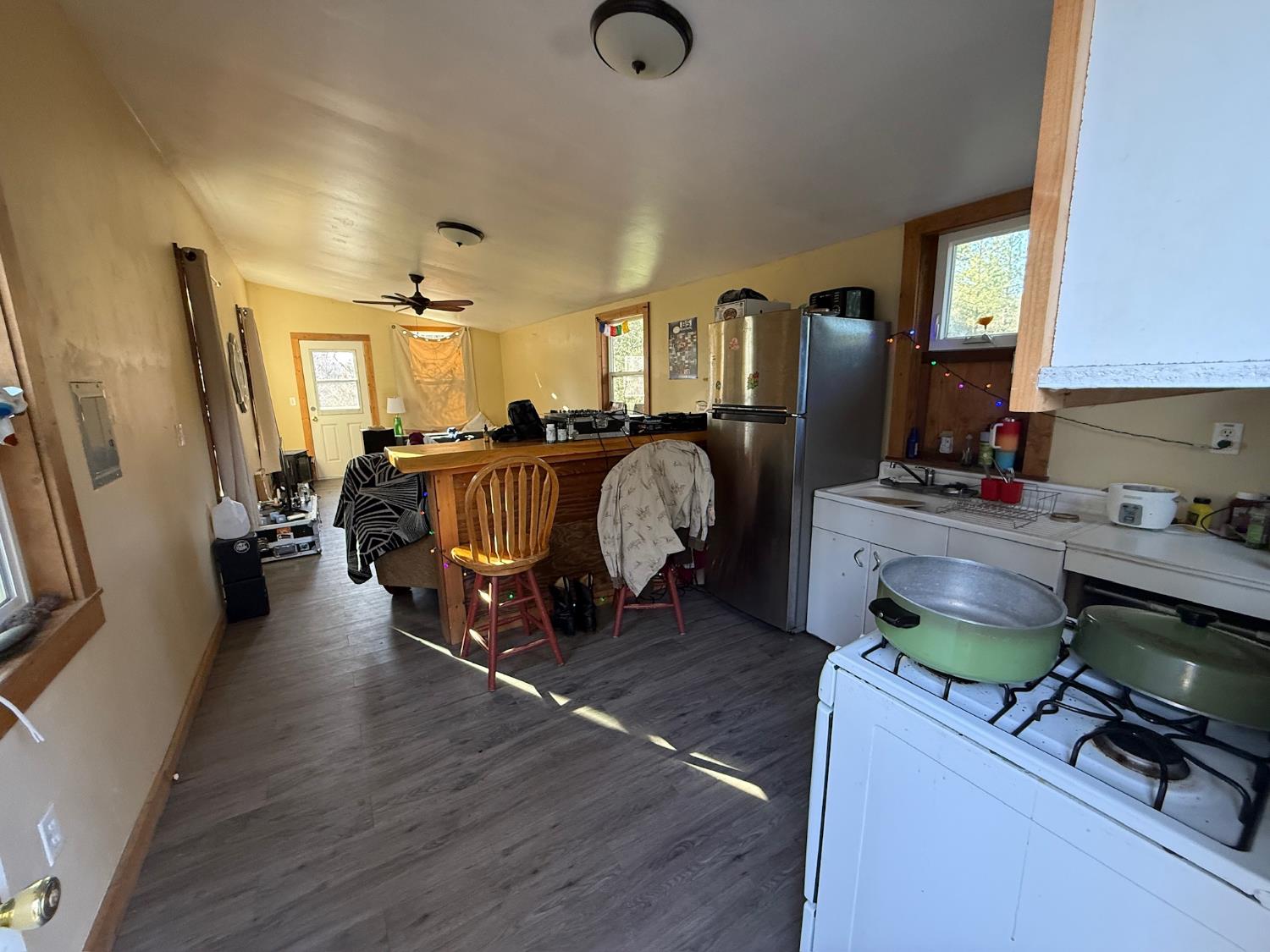 21614 Rockaway Road Nevada City, CA 95959 - Photo 39 of 56 a living room with furniture and a chandelier