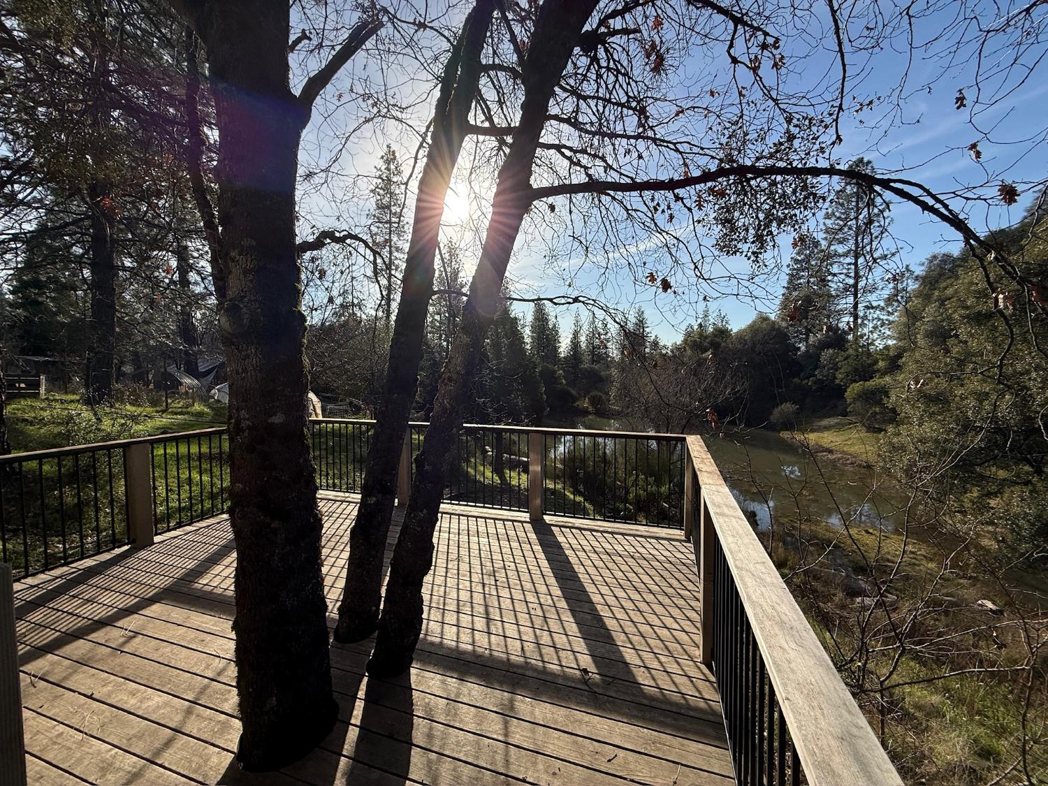21614 Rockaway Road Nevada City, CA 95959 - Photo 48 of 56 a view of balcony with wooden floor and fence