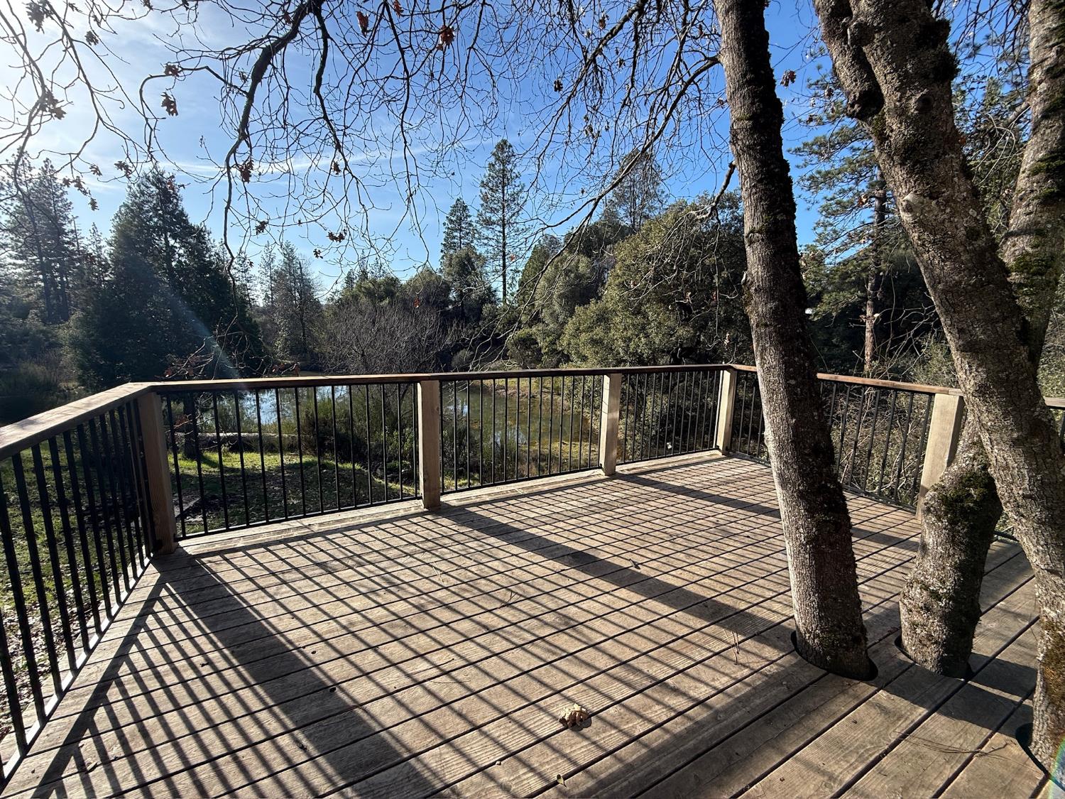 21614 Rockaway Road Nevada City, CA 95959 - Photo 49 of 56 a view of balcony with wooden floor and fence