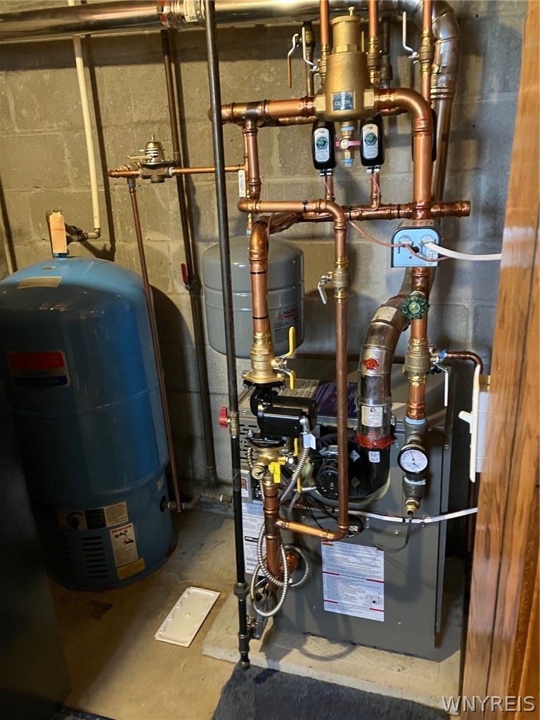 3261 Bacon Road Perry, NY 14530 - Photo 30 of 33 boiler and hot water tank