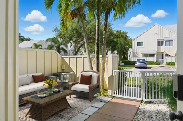 a outdoor living space with furniture and garden view