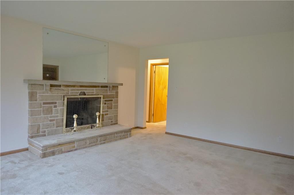 1304 South Main Street Butler, PA 16001 - Photo 3 of 25 Living room with wood burning fireplace.