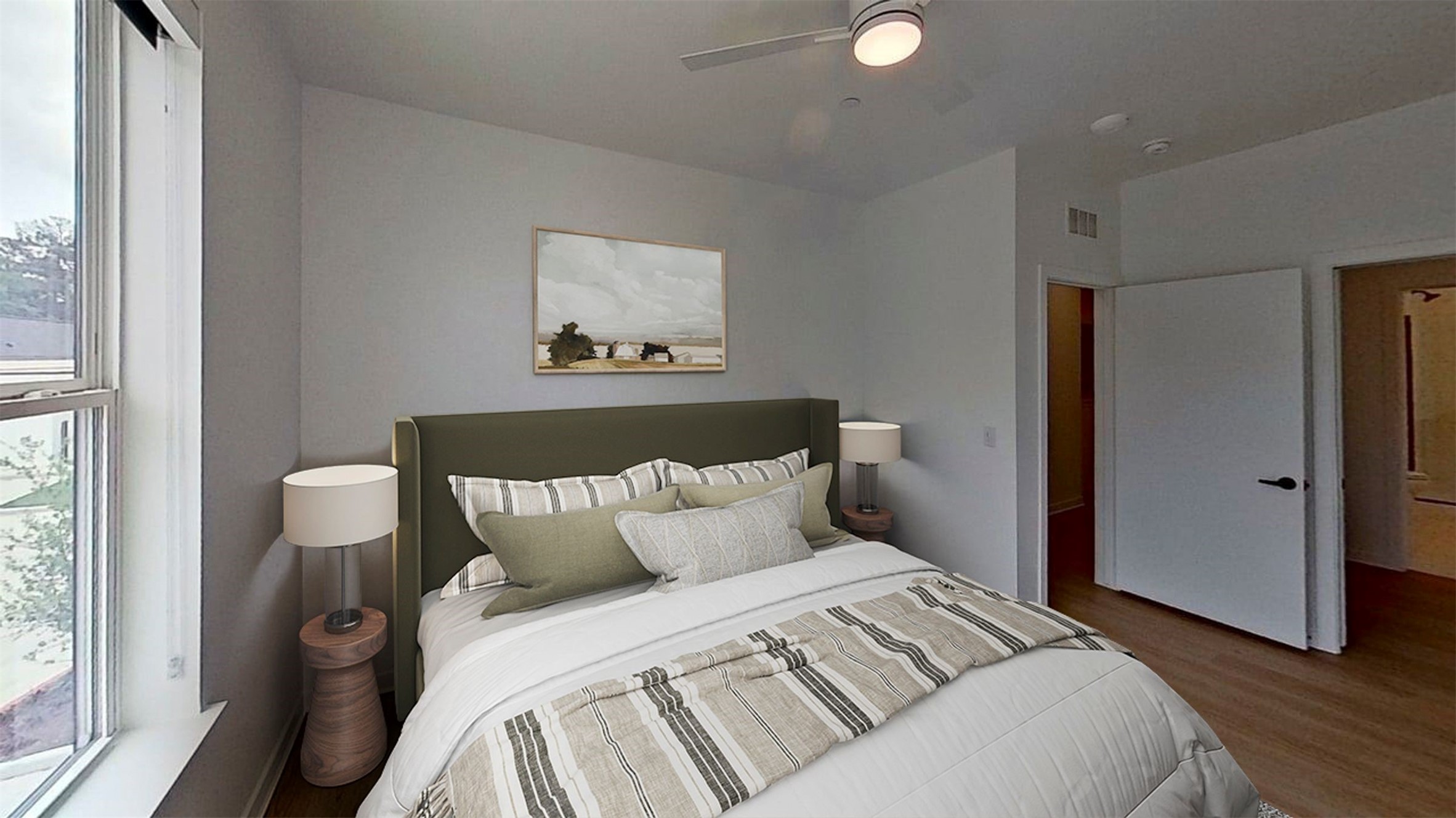 1941 Sawdust Road, Unit 618 The Woodlands, TX 77380 - Photo 6 of 16 a bedroom with a bed and a painting on the wall