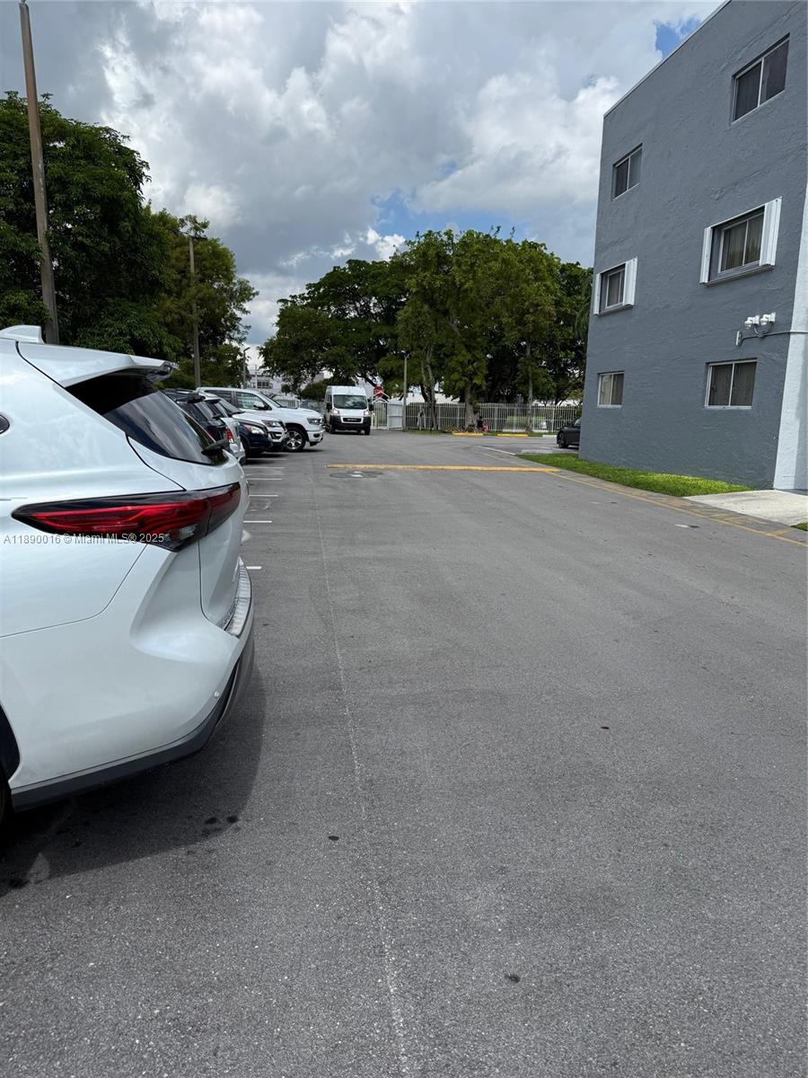 11301 Southwest 200th Street, Unit 305A Miami, FL 33157 - Photo 5 of 26 a view of outdoor space with seating area
