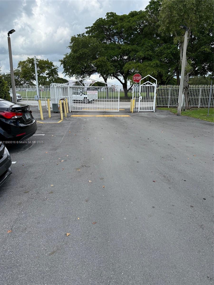 11301 Southwest 200th Street, Unit 305A Miami, FL 33157 - Photo 7 of 26 a view of outdoor space with porch