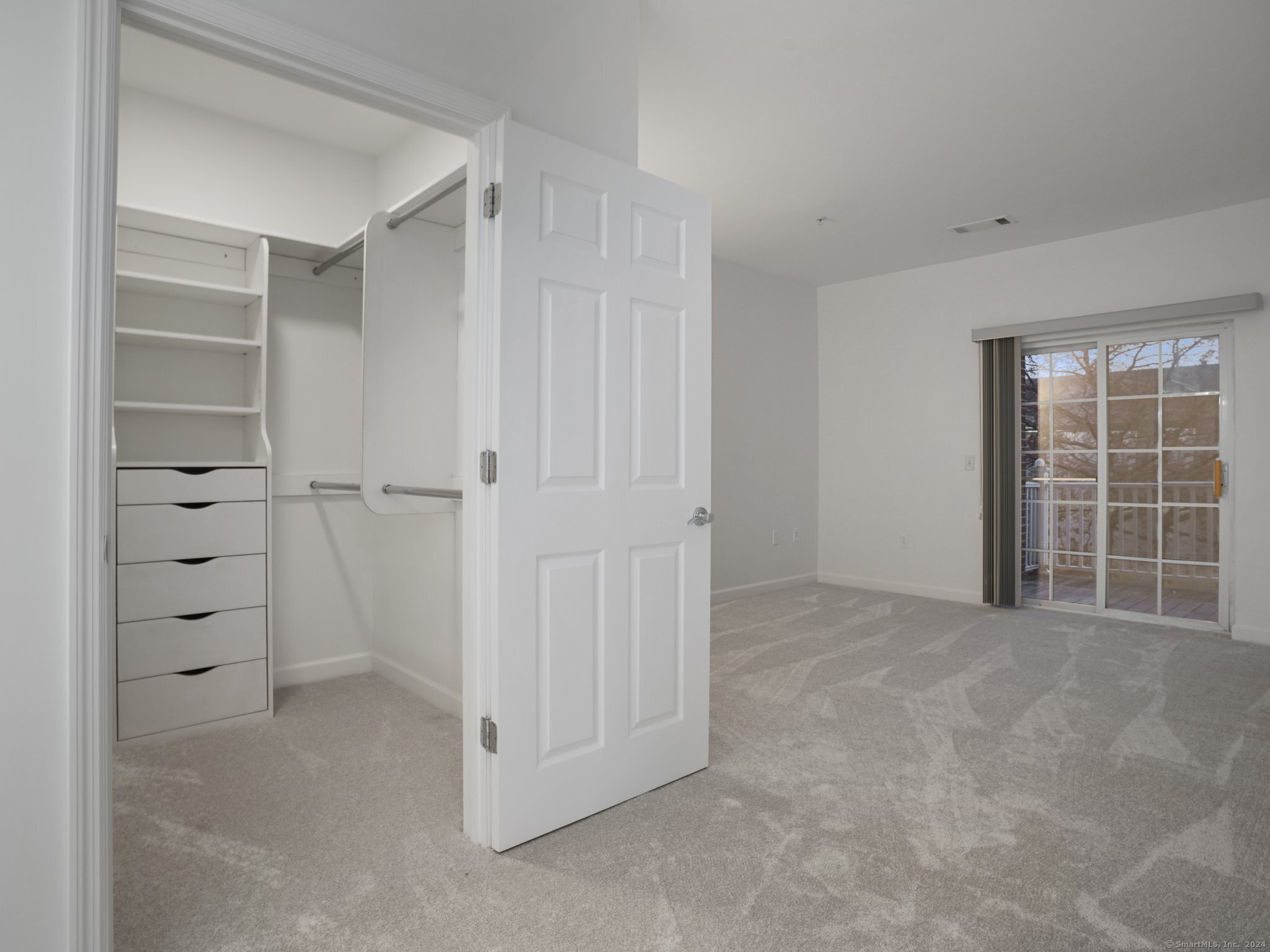 35 West Broad Street, Unit 211 Stamford, CT 06902 - Photo 12 of 38 a view of an empty room with a window