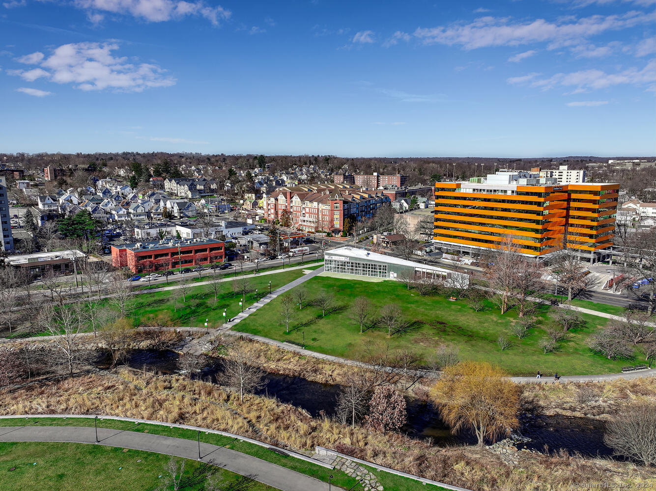 35 West Broad Street, Unit 211 Stamford, CT 06902 - Photo 38 of 38 a backyard of a house with a yard and outdoor seating